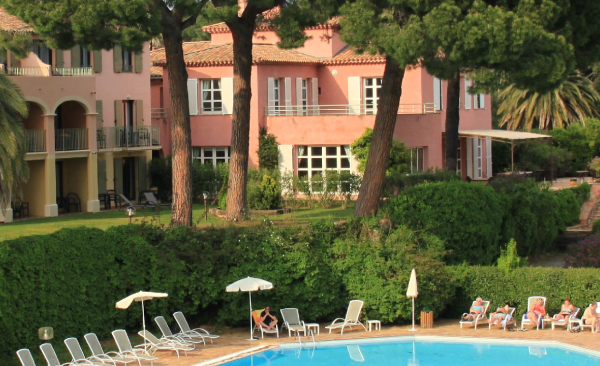 View of a swimming-pool of a hotel France à Vélo