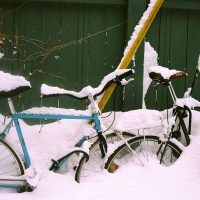 Bicycle in the snow in winter
